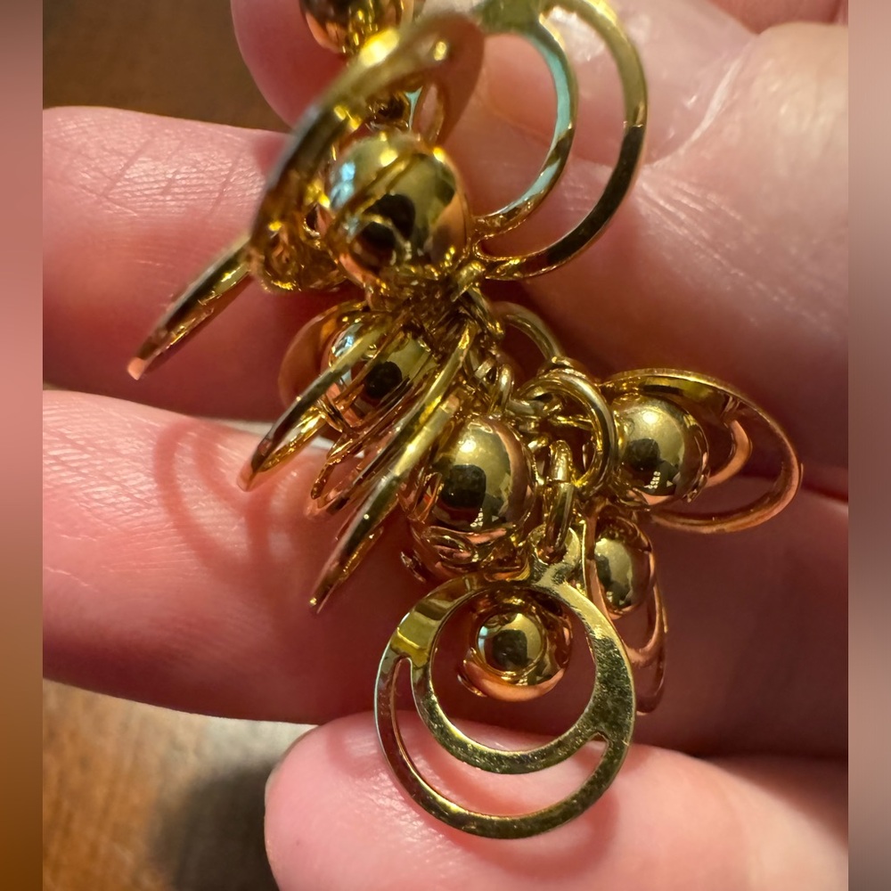 Gold toned earrings. A cute jumble of balls and discs. EUC. Ships with backs on. - Picture 4 of 4